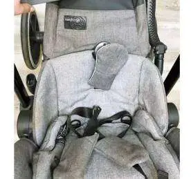 A dirty baby stroller that needs a good clean