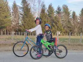 kids sitting on bikes