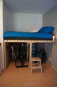 tall bed with bikes stored underneath